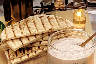 Beet, chickpea, and almond dip with pita chips