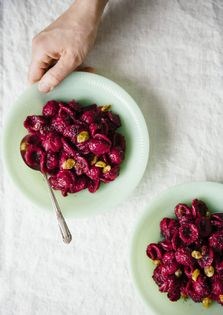 Beet-dressed pasta with golden raisins and poppy seeds