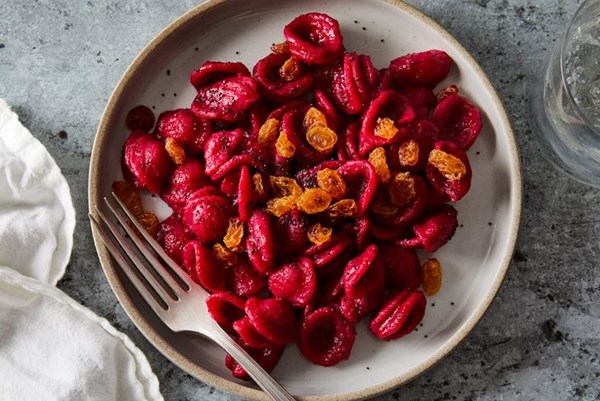  Beet-dressed pasta with golden raisins & poppy seeds 