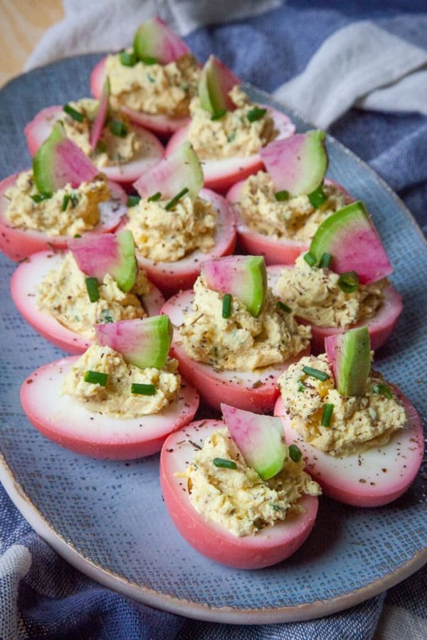 Beet pickled deviled eggs with za’atar and tahini