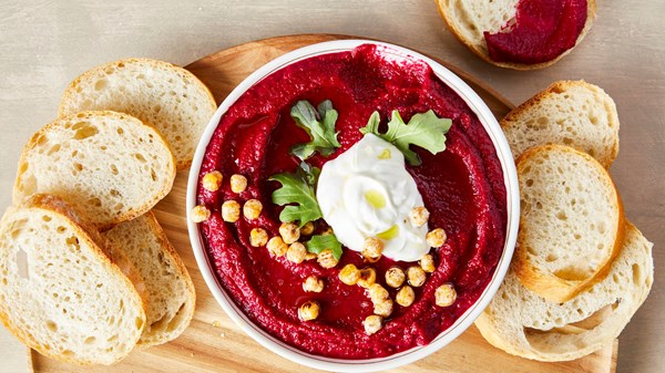 Beet puree with toasted chickpeas, yogurt, and cumin