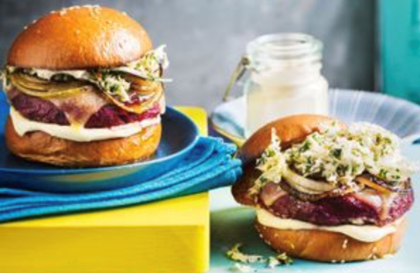 Beetroot and chickpea burgers with onion rings and slaw