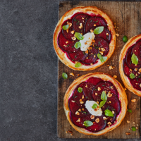 Beetroot tarts with soft cheese and toasted hazelnuts