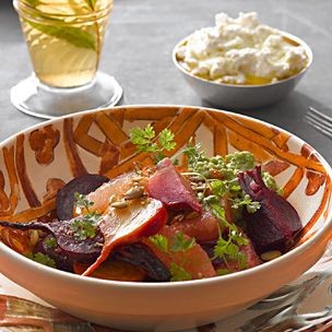 Beets with avocado puree and pumpkin seed crumble