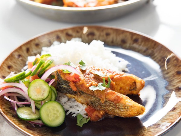 Bengali-style fried fish in onion and tomato curry (Fish bhuna)