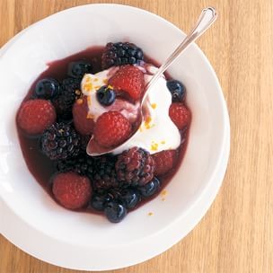 Berries in sangria syrup with ricotta cream