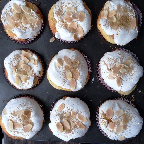 Berry and almond cupcakes with a baked meringue topping