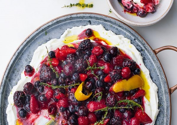 Berry platter with sheep’s labneh and orange oil