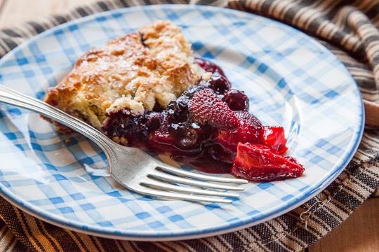 Berry tart with blueberries, strawberries and a crisp corn crust