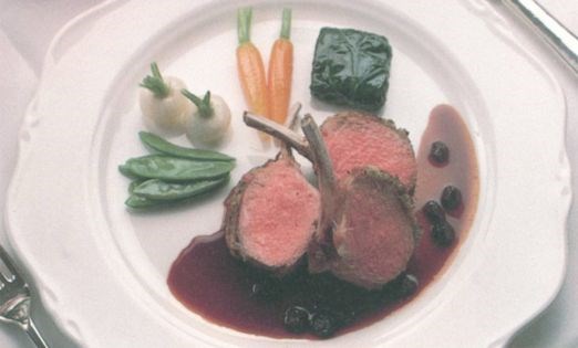 Best end of lamb with a mint and green peppercorn crust served with a currant sauce [Gary Rhodes]