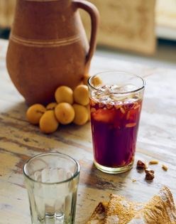 Beverage with molasses, nuts, and raisins (Jallab)