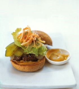 Big apple deli burger with Swiss cheese and barbecue coleslaw