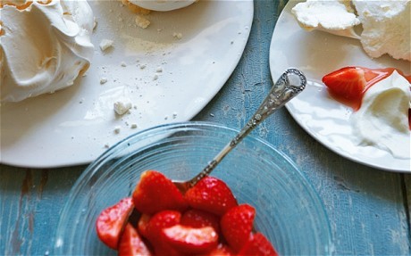 Big meringues with whipped cream and elderflower strawberries