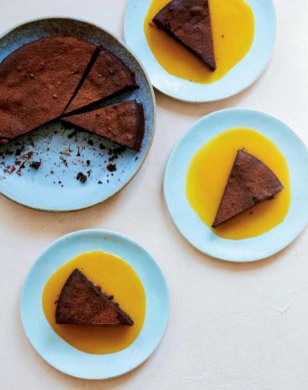 Bitter chocolate torte with passionfruit sauce