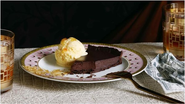 Bitter chocolate whisky tart with orange swirl ice cream