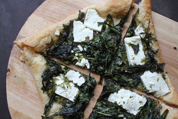 Bitter green salad tart with feta and chilies