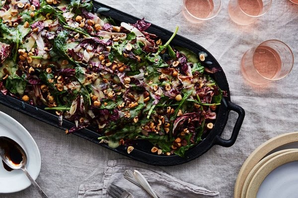 Bitter greens salad with melted cheese