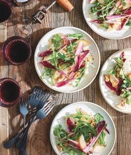 Bitter greens salad with pear and toasted walnuts