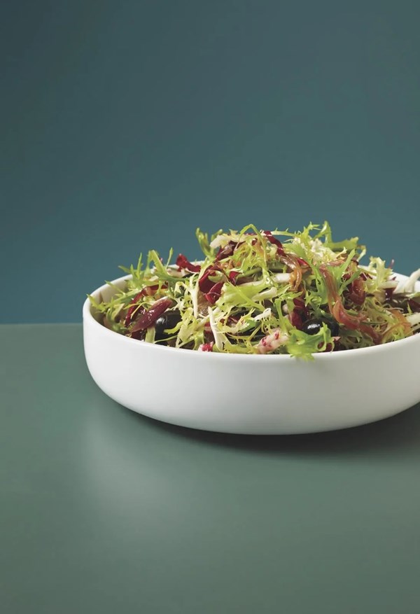 Bitter greens with maple-onion dressing