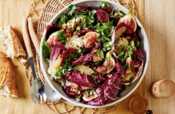Bitter leaf salad with figs, blue cheese and macadamias