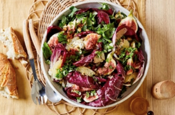 Bitter leaf salad with figs, blue cheese and macadamias