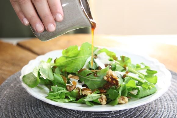 Bitter salad greens with spiced pear paste dressing