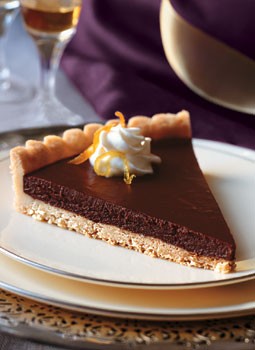 Bittersweet chocolate-citrus tart with jasmine whipped cream