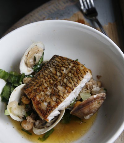 Black bass with chickpeas, clams and chorizo
