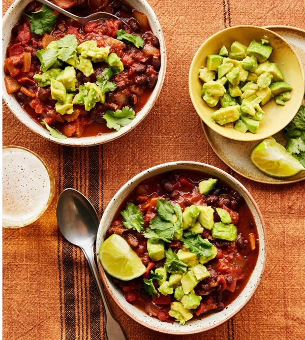 Black bean and tomato soup with avocado and lime