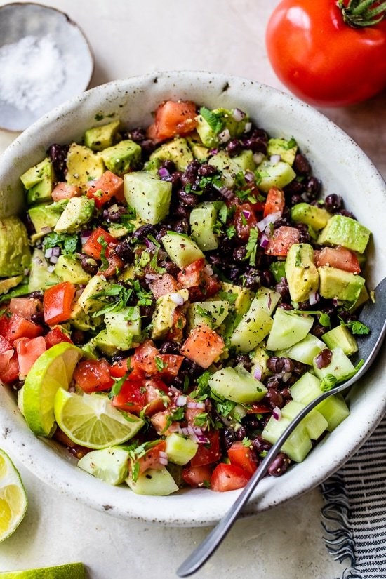 Black bean, avocado, cucumber and tomato salad