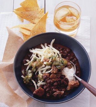 Black bean chili with crispy pork and poblano salsa