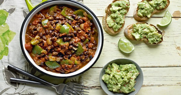 Black bean chilli with guacamole and garlic ciabatta