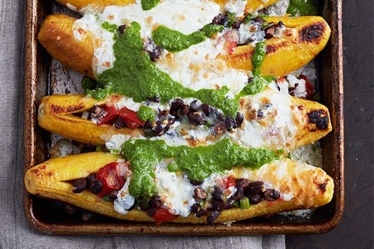 Black bean-stuffed plantains with spicy cilantro sauce