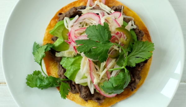 Black bean tostadas with pickled cabbage