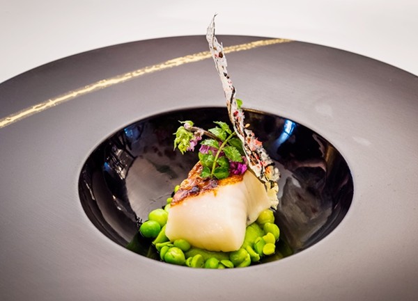 Black cod with petit pois and pea shoots
