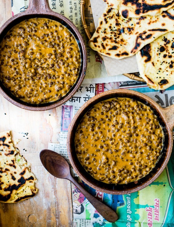 Black dal with paneer-stuffed naan