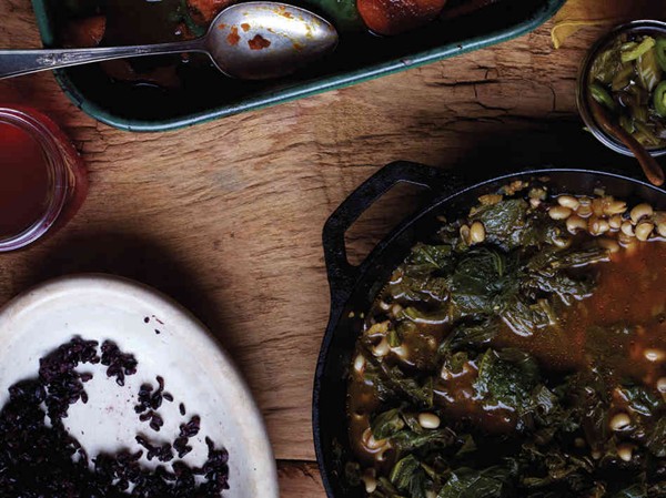 Black-eyed peas in garlic-ginger-braised mustard greens with quick-pickled mustard greens, sesame seeds, and tamari