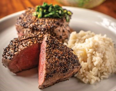 Black pepper–crusted filet mignon with chimichurri