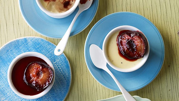 Black pepper pannacottas with vanilla roasted plums