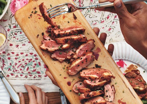Black-pepper-roasted duck breasts with grilled plums