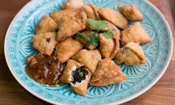 Black pudding and pea samosas