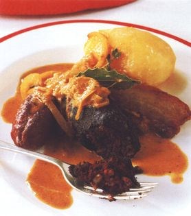 Black pudding and sausages with almonds 