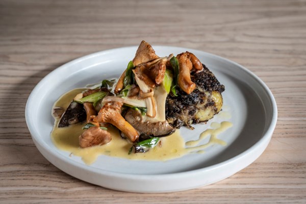 ​​Black pudding hash, wild mushrooms, spring onions and tarragon 