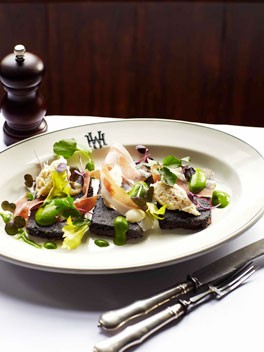 Black pudding with crab mayonnaise, apple sauce and pea purée