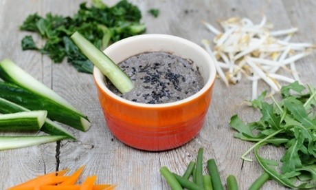 Black sesame seeds and peanut sauce with steamed veg