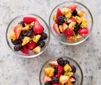 Blackberries, strawberries, and peaches with basil and pepper