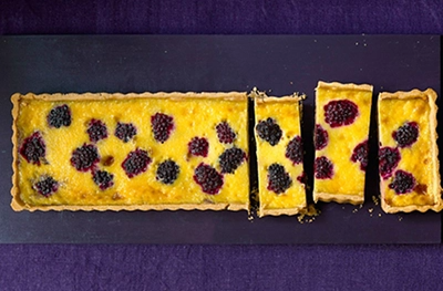 Blackberry & bay custard tart