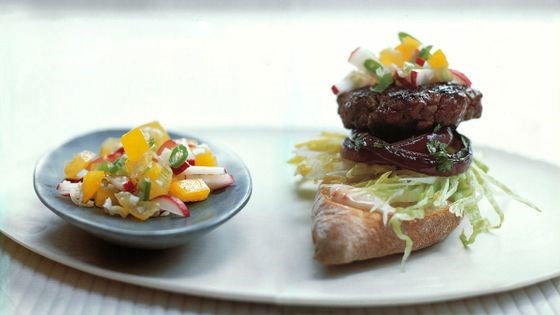 Blackened burger with grilled onion salad and yellow pico de gallo