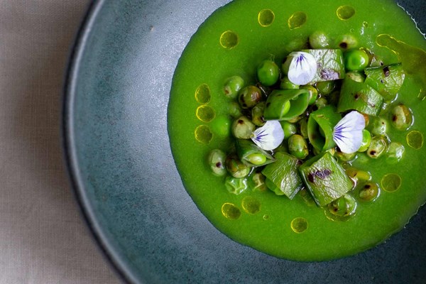 Blackened peas with pea shell juice