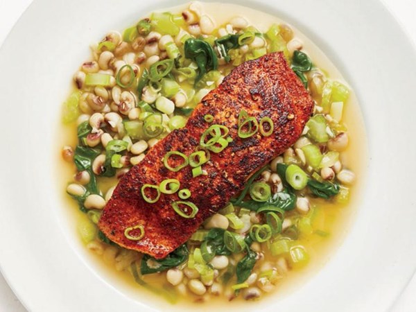 Blackened salmon with spinach and black-eyed peas